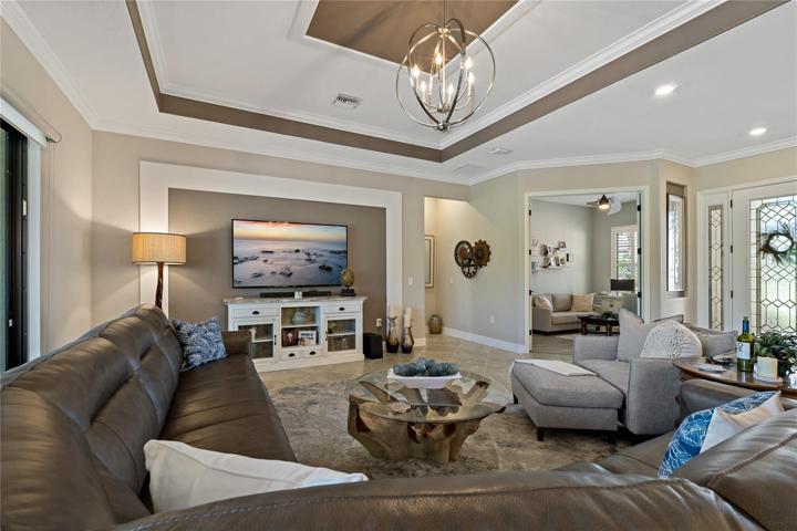 GORGEOUS TRAY CEILING IN FAMILY ROOM!