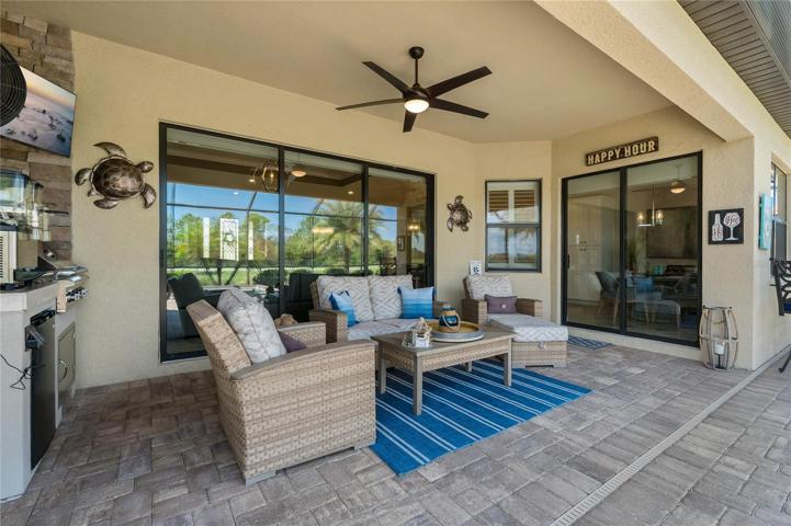 COVERED PATIO WITH OUTDOOR KITCHEN!