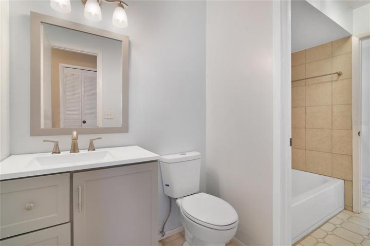 A half bath in adjoined to the primary, perfect for guests!