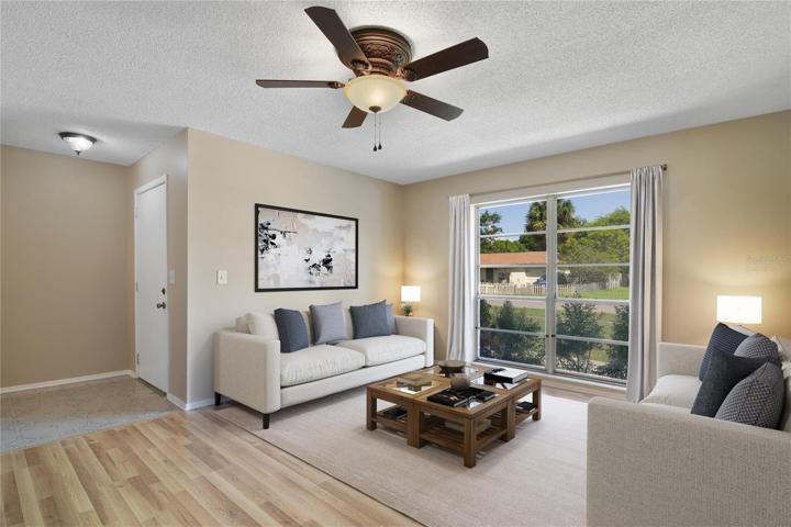 Large windows let the NATURAL LIGHT shine throughout and your KITCHEN and BATHROOM have both been UPDATED! Virtually Staged.