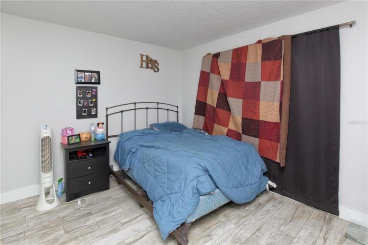 The main bedroom, which looks out to the back yard facing the north.