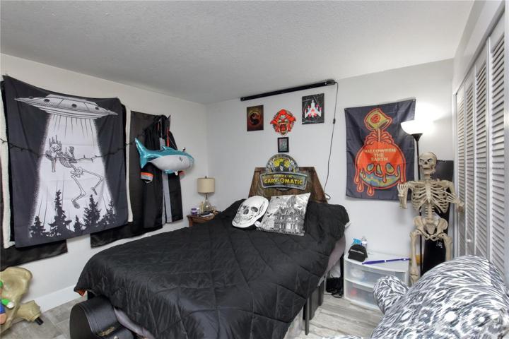 The main bedroom in the downstairs unit on the left of the building.