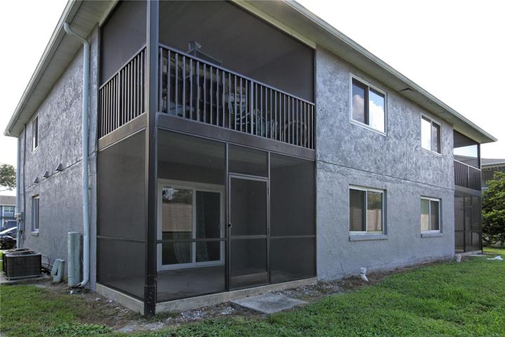 Sliding glass doors go to to the covered and screened patios.