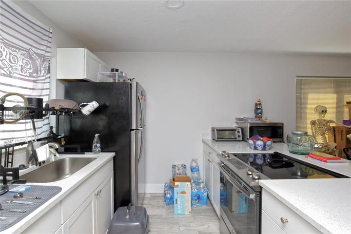 The lower left unity showing a remodeled kitchen.
