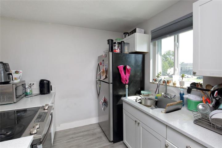 The kitchen of the upstairs right unit.