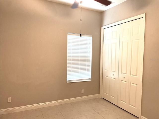 Tiled Bedroom next to stairs