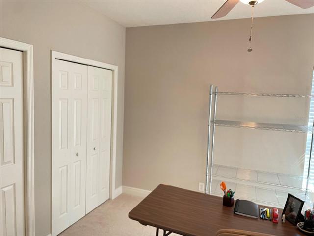 Upstairs carpeted bedroom