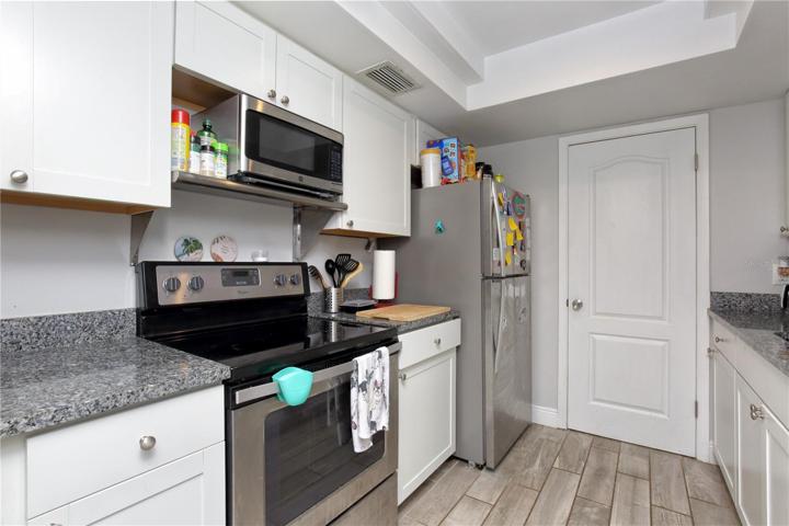 Stainless steel appliances, granite counter tops, new cabinets, floors, and more.