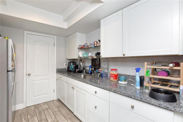 This photo shows the kitchen has been remodeled.