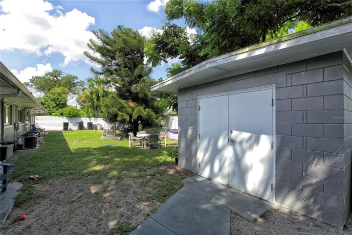 A storage area and backyard.