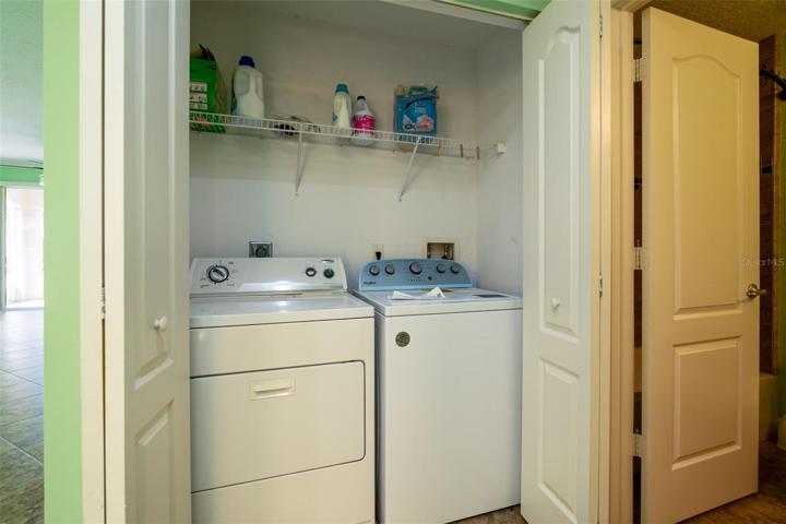 laundry room with new wash machine