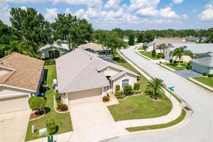 CORNER LOT with oversized side yard with partial lake view