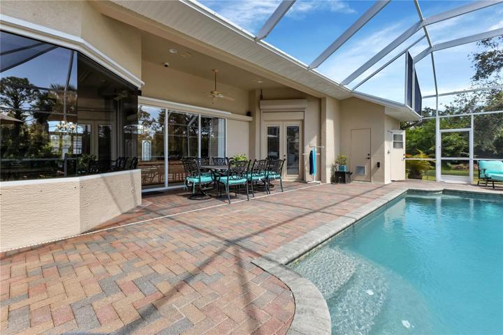 Pool, lanai, pavers, aquarium glass