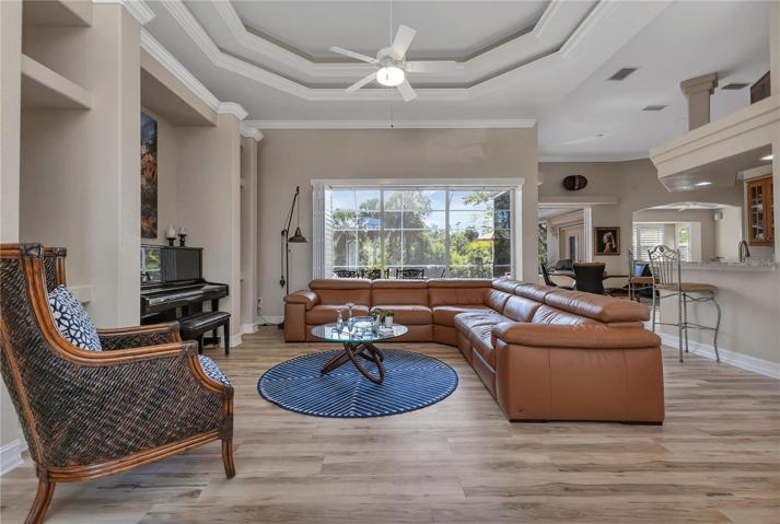 Living room - view from entry foyer to pool/lanai