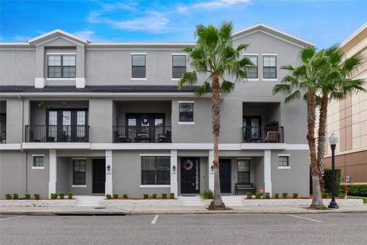 This stunning 3-STORY TOWNHOME is nestled in the heart of Avalon Park for the epitome of low maintenance living where you can take a short stroll to shopping, dining, parks and more!