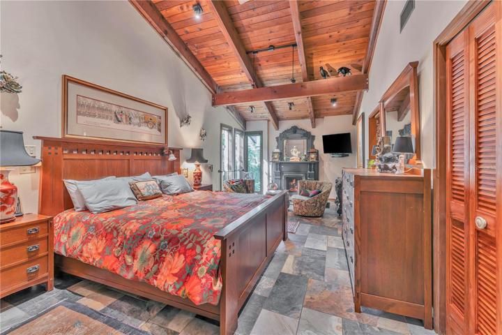 Primary suite features gas burning fireplace