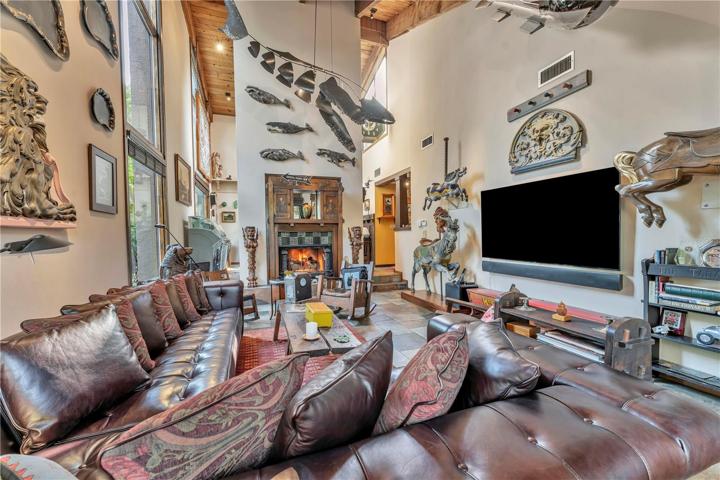 Living room features gas burning fireplace