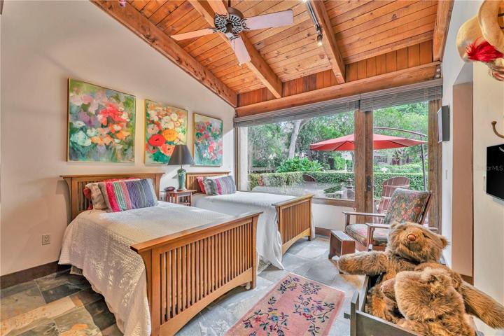 Guest bedroom overlooks front patio