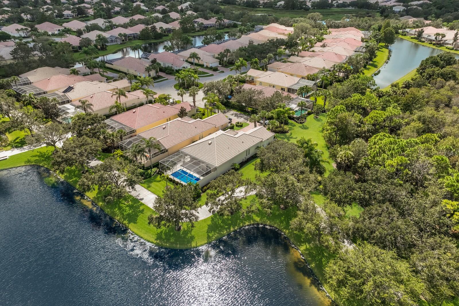 Aerial of back of home, Octonia Place, and preserve next door