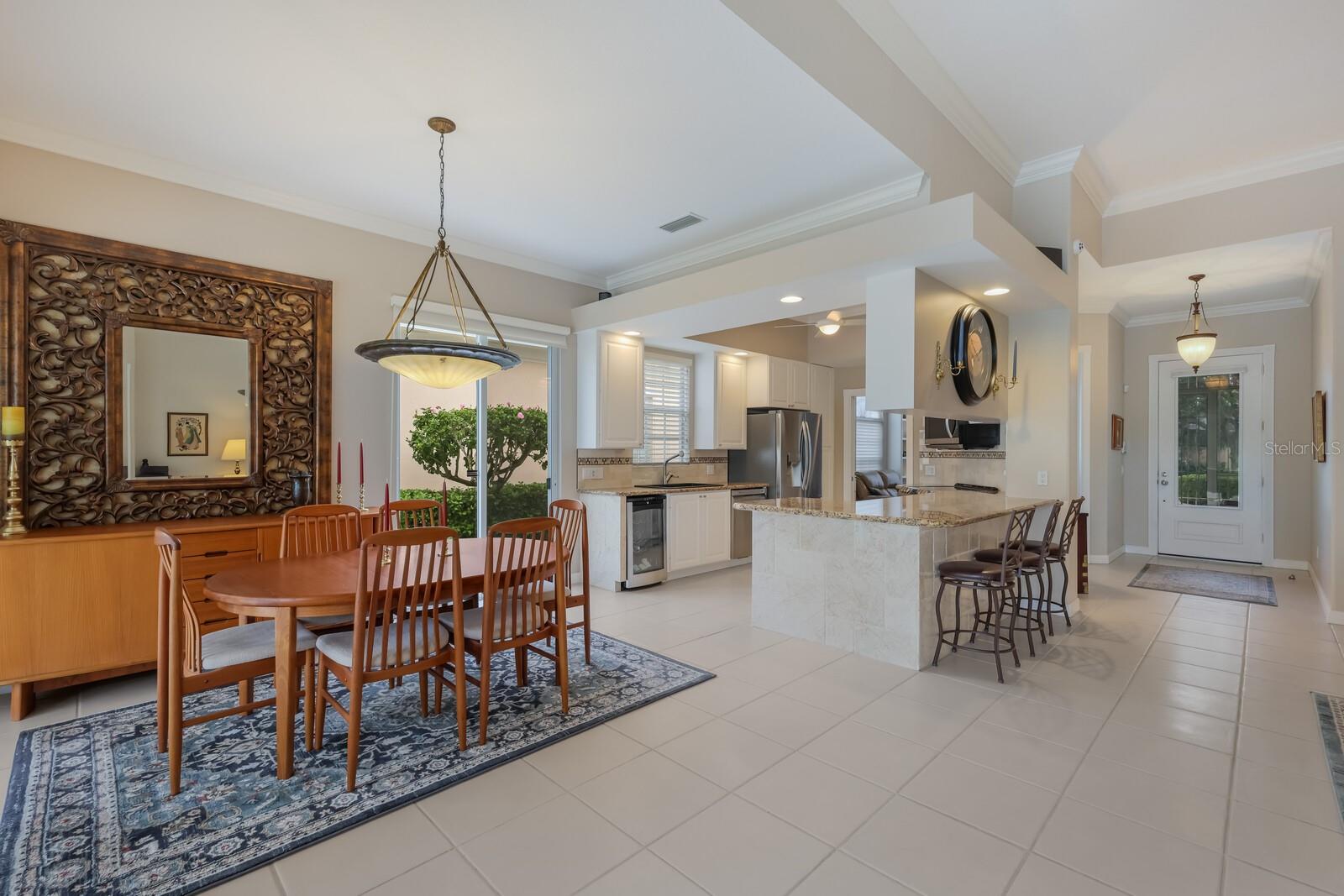 Dining to gathering room and kitchen