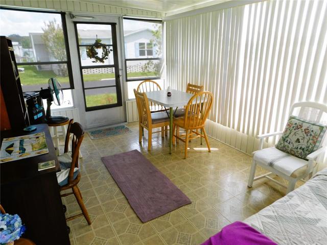 You can exit the Florida room to front patio area.