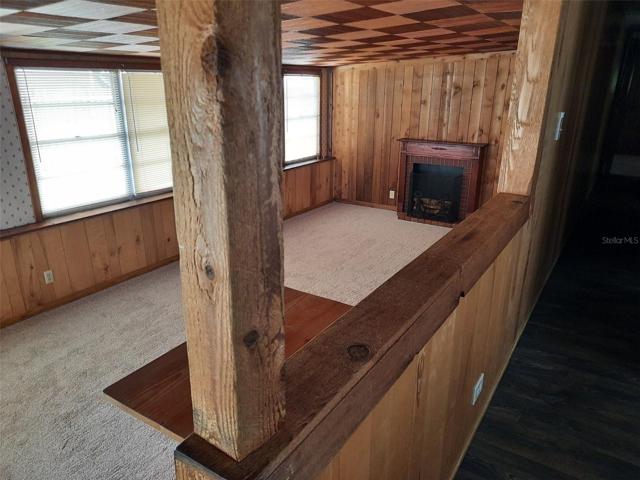 View of living room from top of stairs