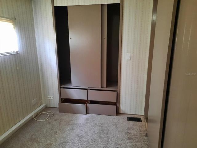 2nd Bedroom closet & built-in storage
