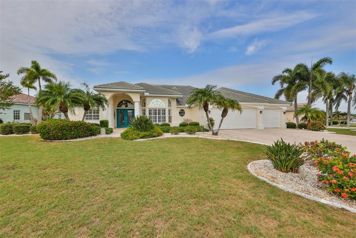 Front View, 3 Car Garage, Paved Driveway