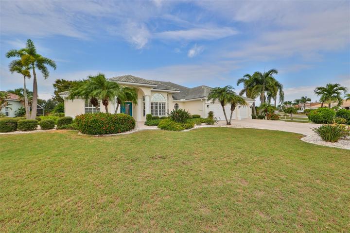 Front View, 3 Car Garage, Paved Driveway
