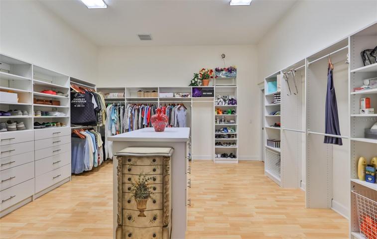 Jumbo Primary Custom Closet with Center Island Cabinet
