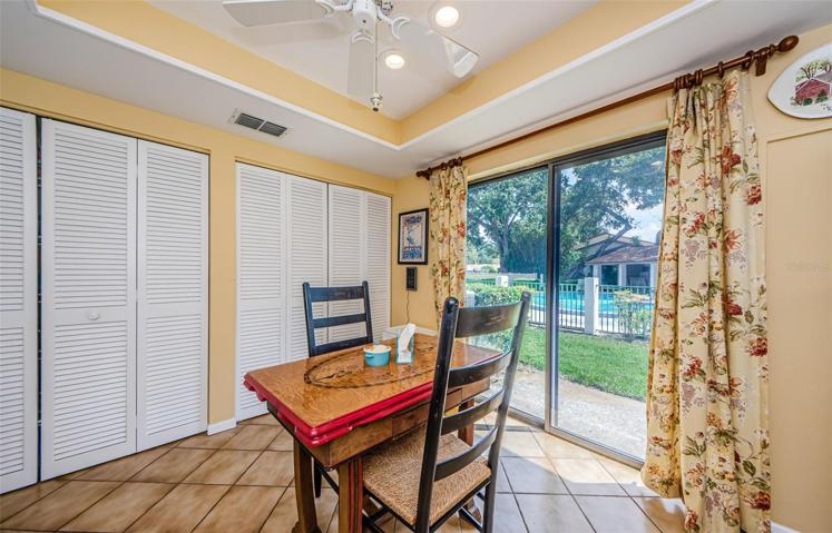 View of kitchen overlooking community pool