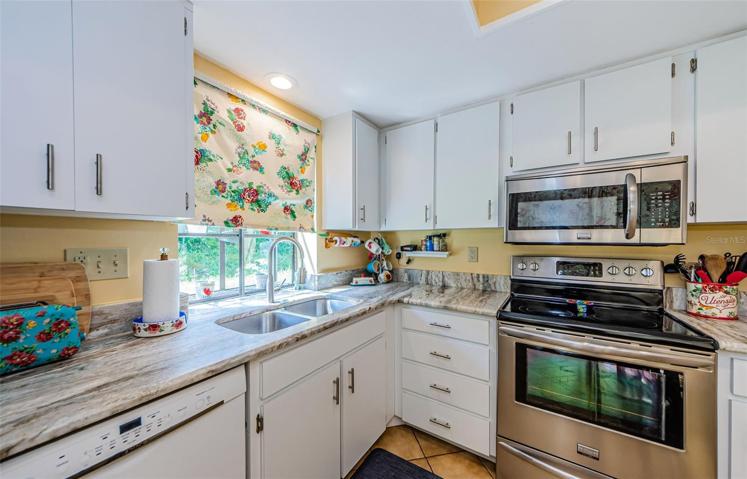 Kitchen with plenty of counterspace and granite countertops