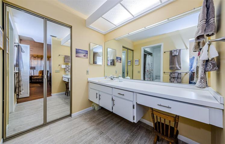 Master bath with tile flooring
