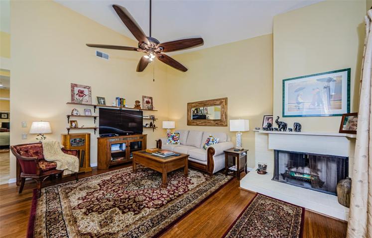 Family/living room with fireplace and high ceilings