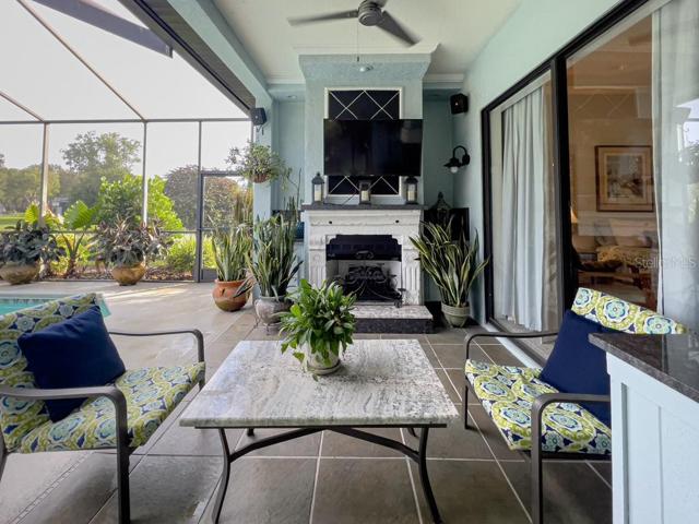 Outdoor seating area with fireplace