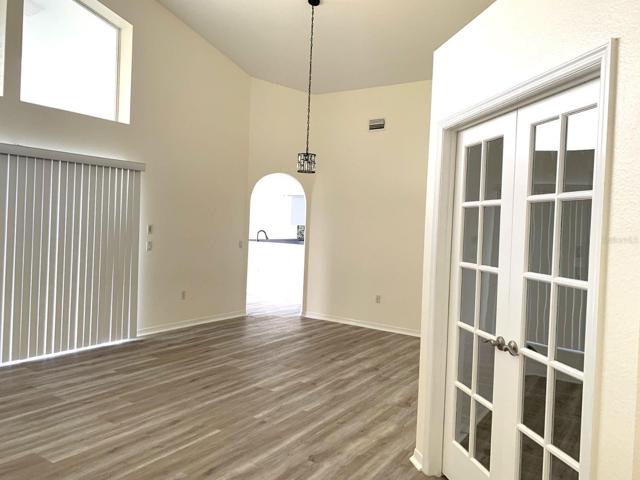 Livingroom/Dining area with entrance to kitchen