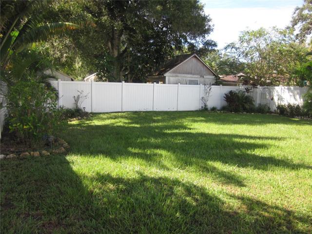 Large vinyl fenced yard