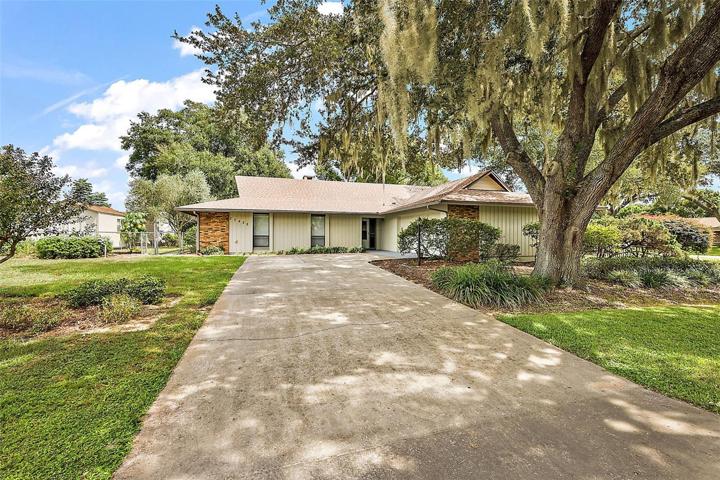 Front of home and Drive to 2 car garage
