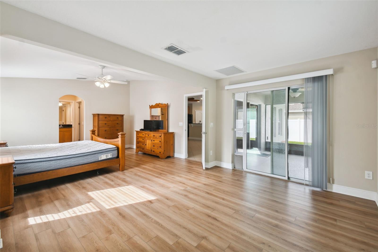 View of sitting room and master suite - access to the lanai via sliding glass doors