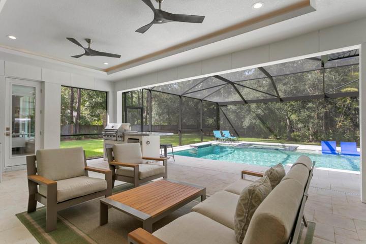 Tray ceilings complete the outdoor living spaces
