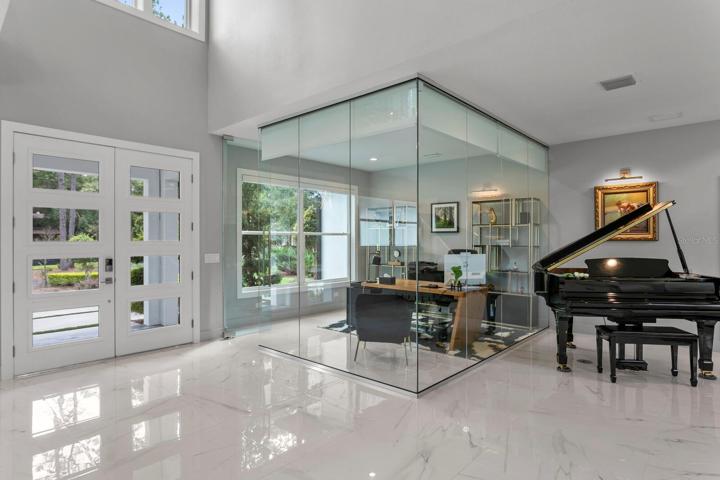 Home office located just off the foyer