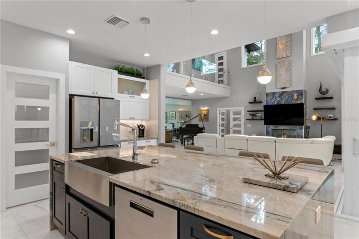 Open kitchen with views into living room