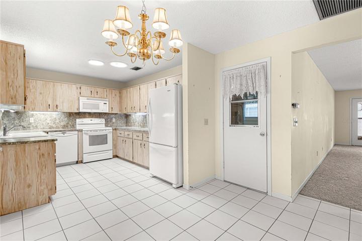 Newer Appliances and Spacious Kitchen.  Door to 1.5 car garage.