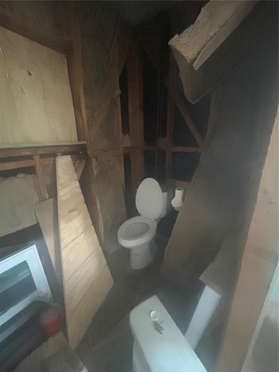 Upstairs unfinished restroom
