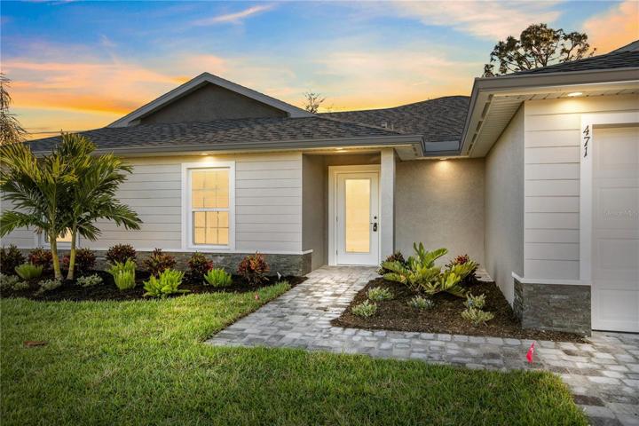 Walk up your extended paved driveway and through a beautiful custom door that allows natural light!  This is NOT your ordinary cookie cutter home!  Synergy Homes has multiple models in different areas throughout SWFL - this is the 