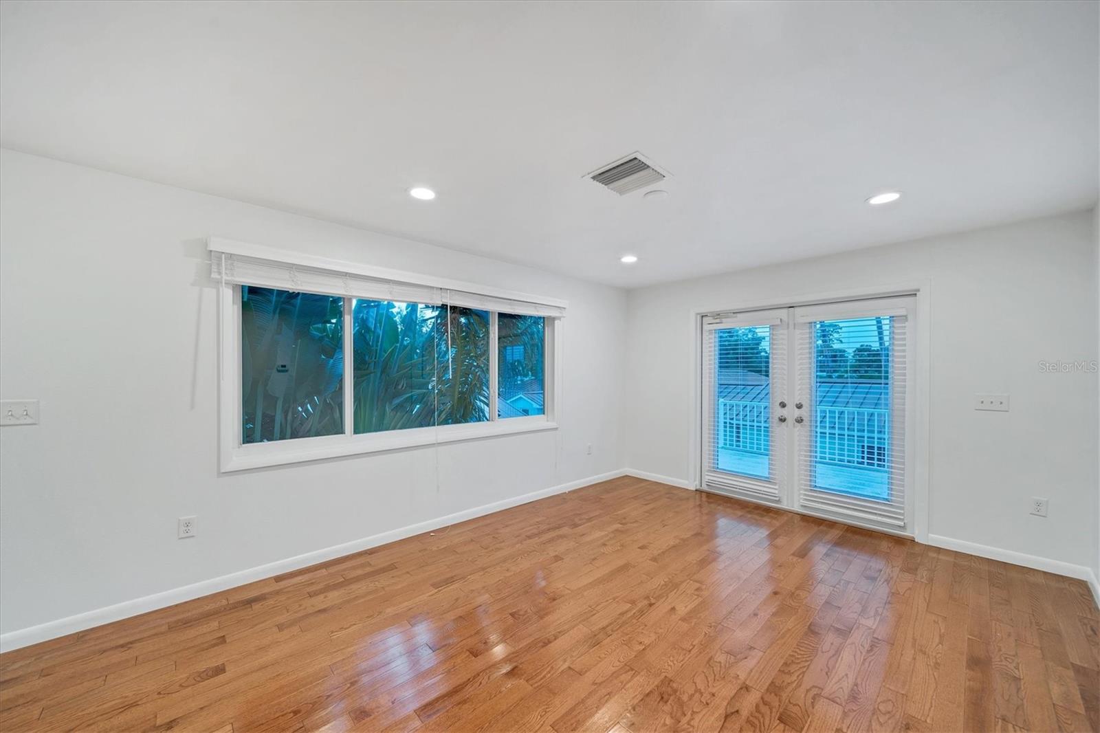 Living room with French doors to balcony