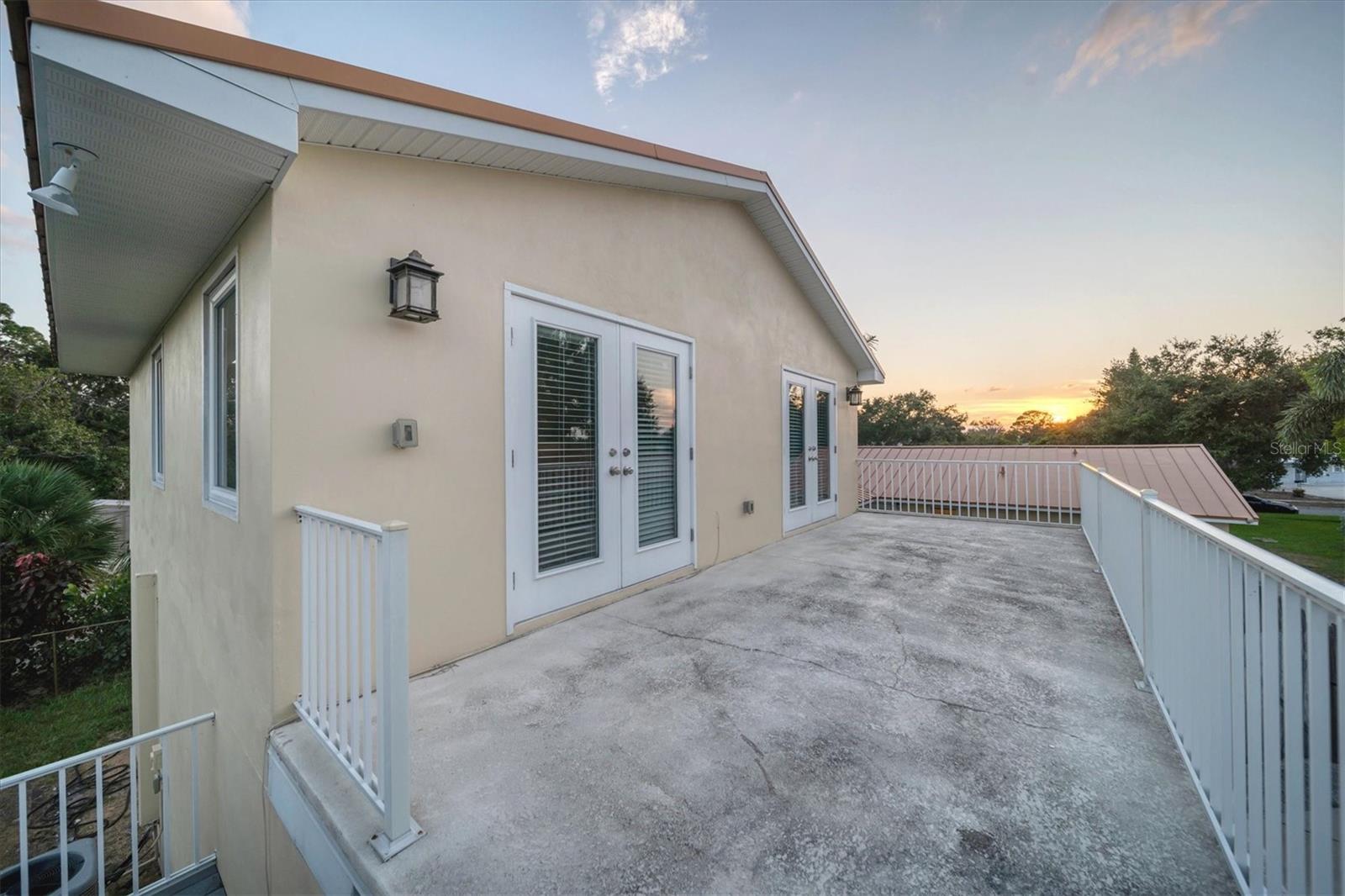 Upstairs unit with balcony
