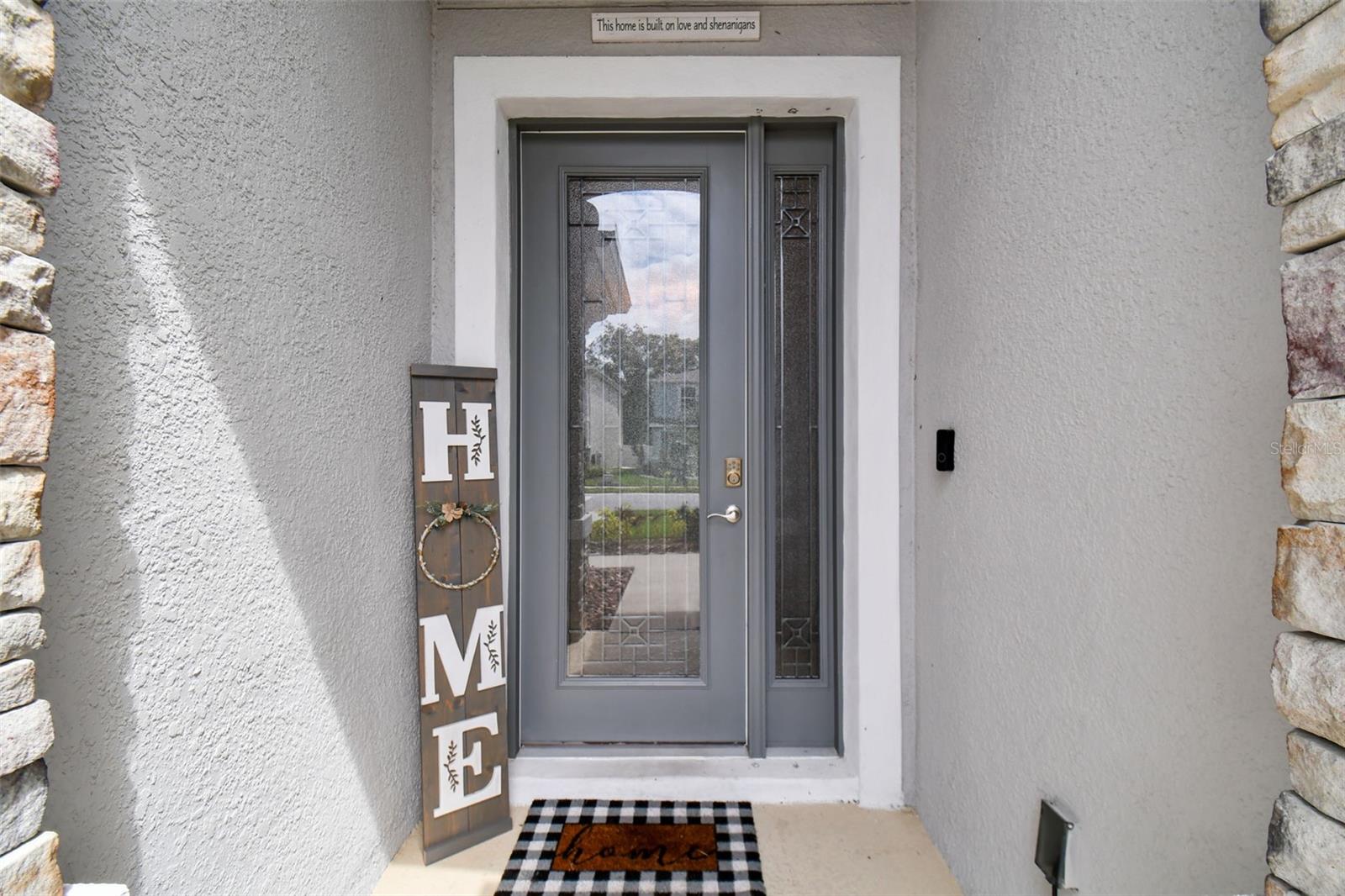 Designer etched glass door insert and sidelight window.