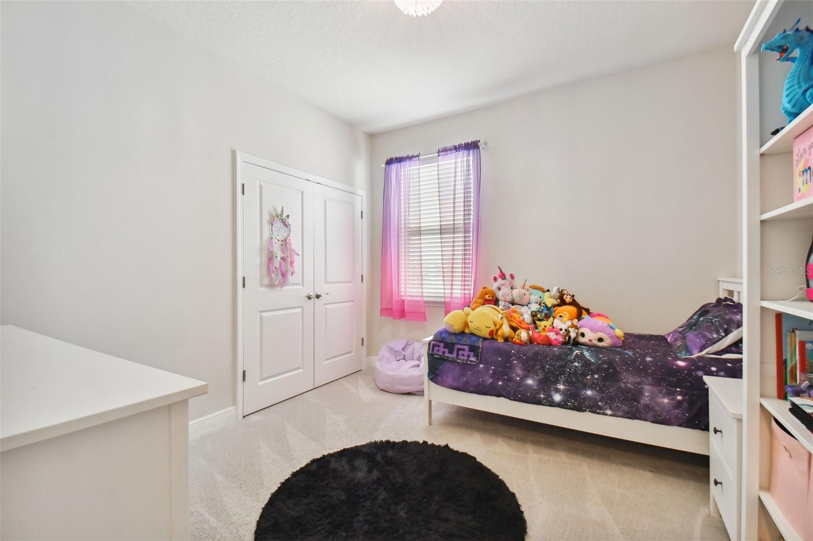 The third bedroom has plenty of space. Large reach-in closet.