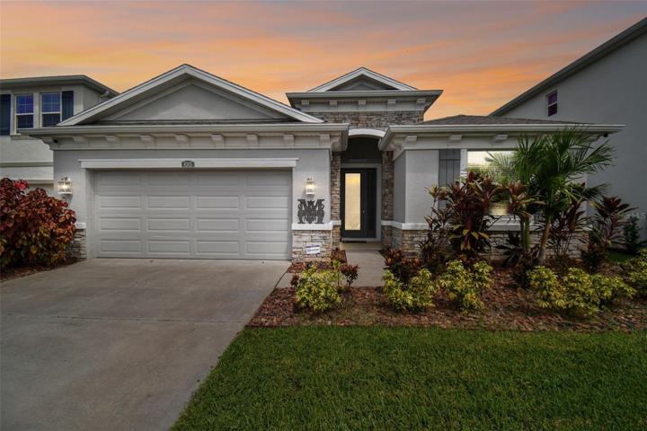 Upgraded stone elevation on this desirable Latana model.